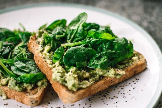 a plate with avocado toast and nuts