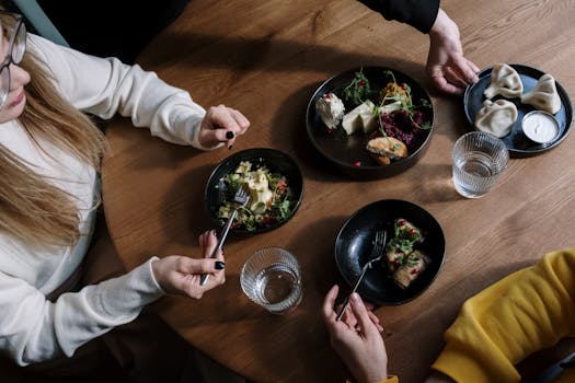 group cooking traditional dishes together