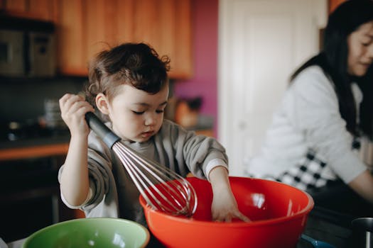 image of kids helping in the kitchen