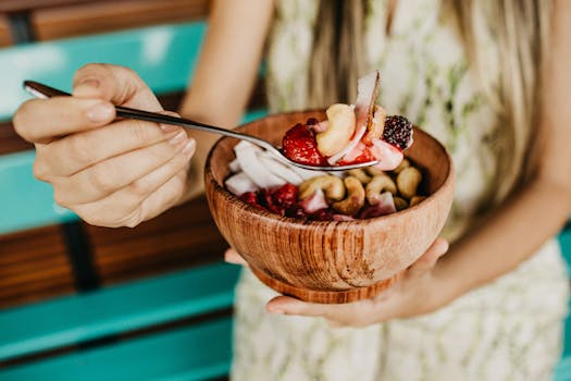 colorful breakfast bowl with fruits and nuts