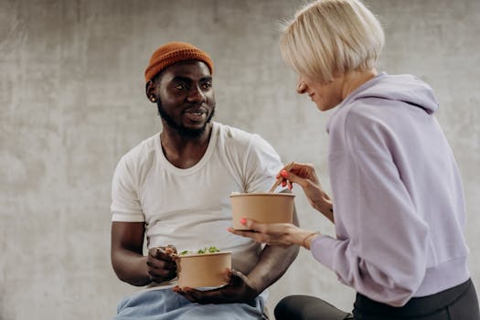 happy group of friends enjoying healthy food